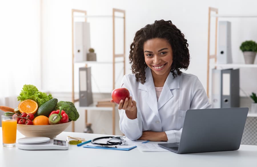 Physician Holding An Apple