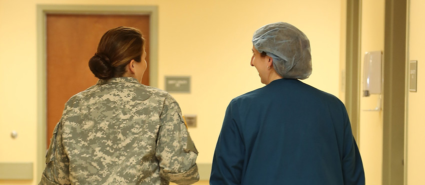 Nurse Escorting Military Personnel