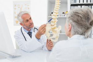 Photo Of A Doctor Explaining Bone Information To A Patient - Carthage Area Hospital