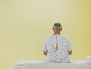 Photo Of A Man Sitting On A Hospital Bed - Carthage Area Hospital