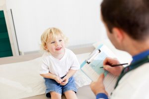 Photo Of A Doctor Examining A Child - Carthage Area Hospital