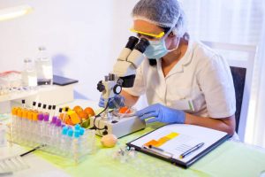 Lab worker analyzing blood work