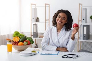 Nutritionist sitting at her desk